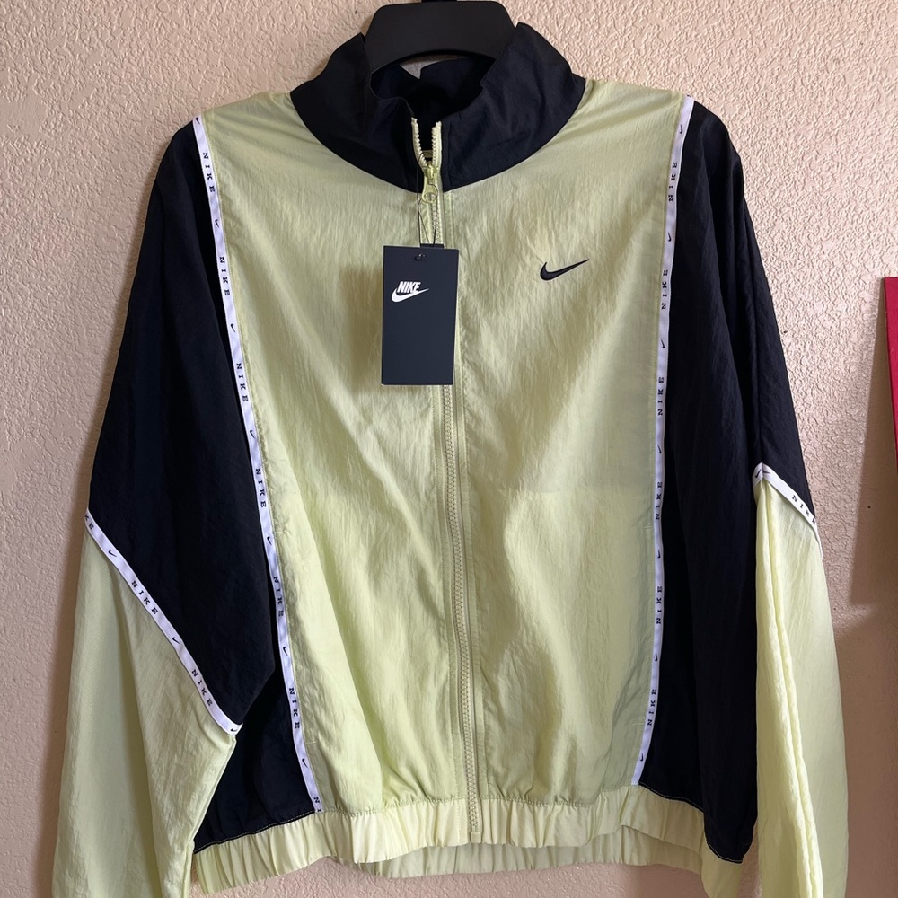 Black and Neon yellowish green Nike windbreaker